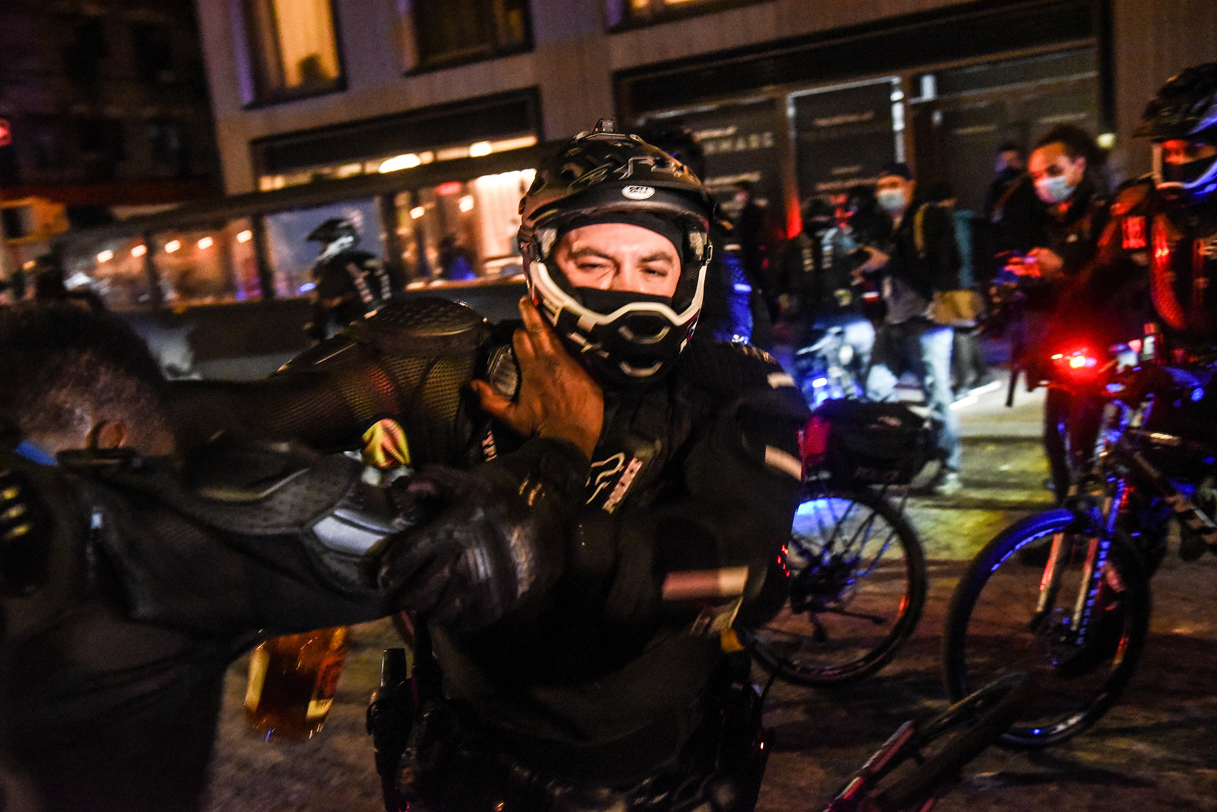 A demonstrator struggles while being detained by a New York Police Department (NYPD) officer at a protest during the 2020 Presidential election in New York, U.S., on Thursday, Nov. 5, 2020. Joe Biden stood on the brink of claiming the presidency from Dona
